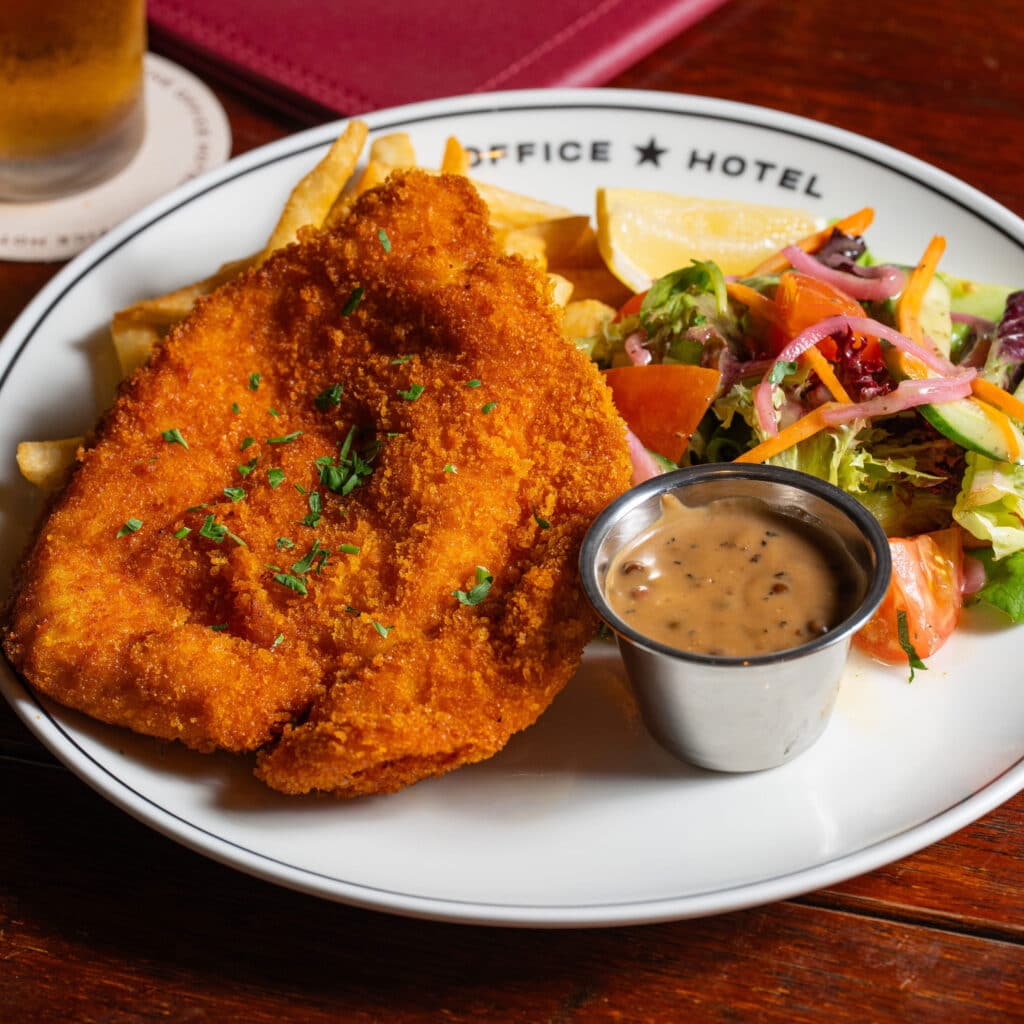 Chicken Schnitzel with chips and salad